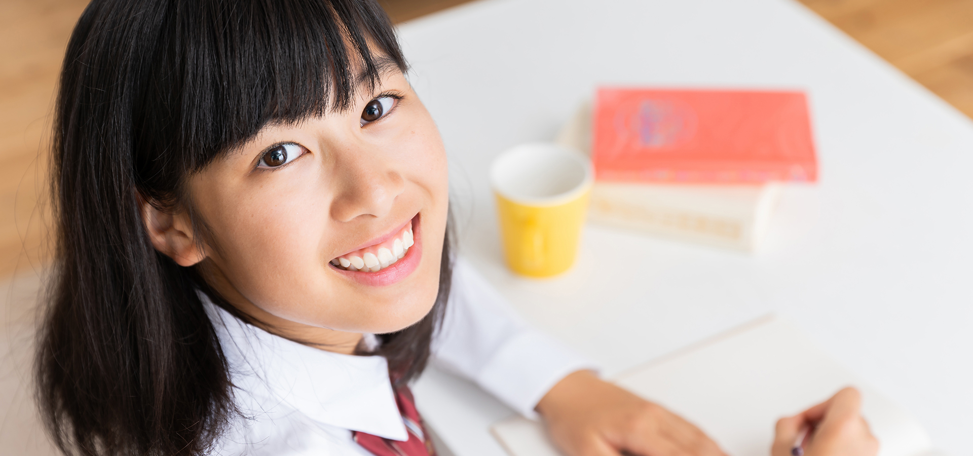 写真:笑顔の学生